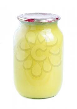 Royalty Free Photo of a Jar With Something Yellow