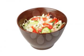 fresh salad with tomato, cabbage and cucumber on bowl isolated on white 

