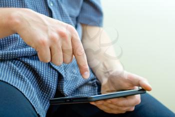 Royalty Free Photo of Hands With a Tablet