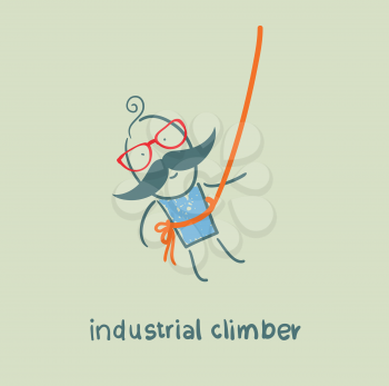 industrial climber hanging on a rope