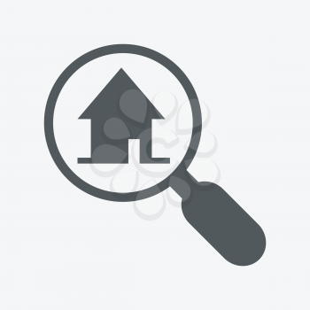Finding a home. magnifying glass and house icon