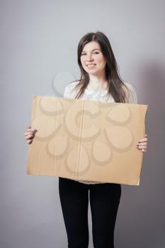 girl, holding a poster