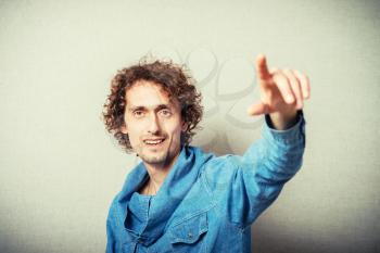 young  man, pointing at someone gesture with finger