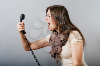 woman talking on landline