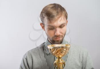 young man with a Cup