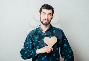 hipster with greeting, heart