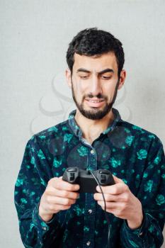 Half-length portrait of man  and video game
