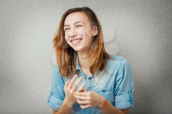 woman laughing. isolated on gray background