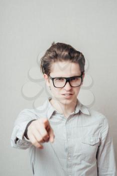 picture of attractive businessman in glasses pointing his finger