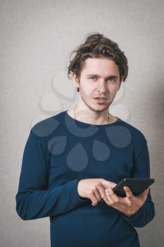 Young Man Using Digital Tablet