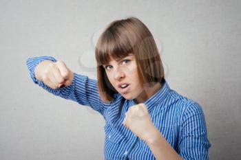 young woman in fighting stance