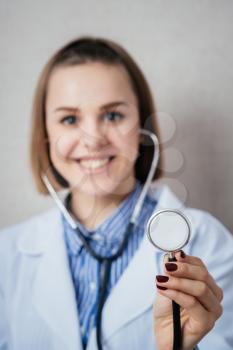 young female doctor with stethoscope