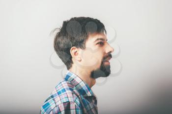 bearded man in profile