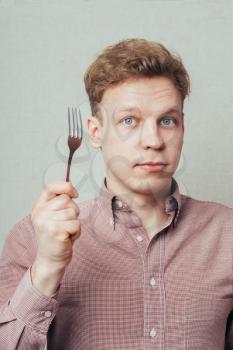 man with a fork