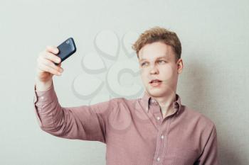 man photographed on mobile