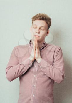 Man Praying With Hands Closed