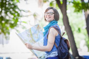 Girl tourist with map 