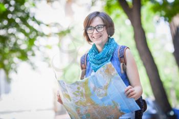 Girl tourist with map 