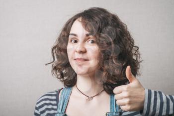 Woman showing thumbs up