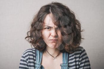 Portrait of disgusted woman