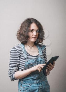Beautiful  business woman reading tablet computer.