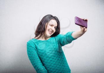 girl, photographed on a mobile phone