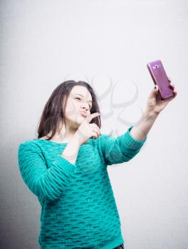 girl, photographed on a mobile phone