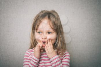 little girl child have toothache, emotions large inflated cheek emotion background