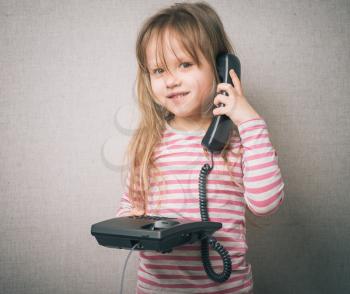Little girl on the phone