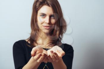 girl holding something invisible