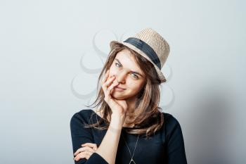 Portrait of a Beautiful Young Woman in hat