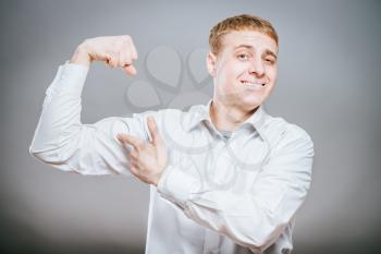 Guy making power gesture 