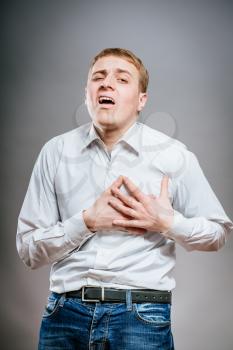 Businessman with heart attack isolated