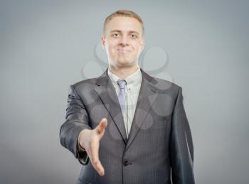 Businessman shaking hands isolated 