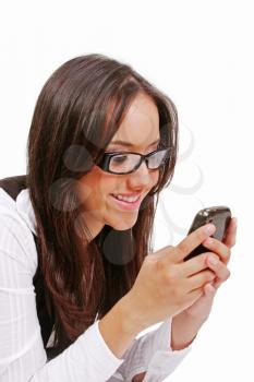 Beutiful happy woman sending text at mobile phone