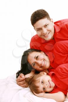 A family portrait of mom, dad and their daughter; isolated on the white background 
