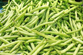Many green beans (Phaseolus vulgaris L.) on a pile 