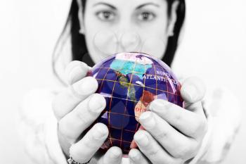woman holding the world in her hands 
