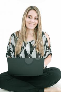 Woman with a laptop computer - isolated over a white background 
