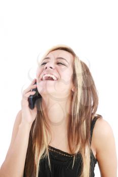Young beautiful woman bursting out laughing on cellphone. 
