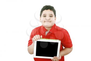 Young boy holding a tablet computer isolated on white 
