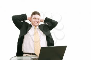 Young business man relax with happily after working 
