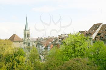 Berne, Switzerland. Beautiful old town. Prominent cathedral tower. 
