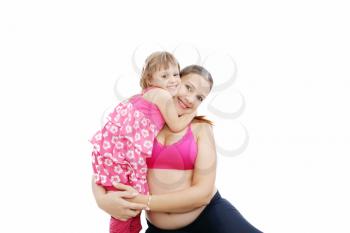 Beautiful pregnant woman with her daughter. Isolated on white background
