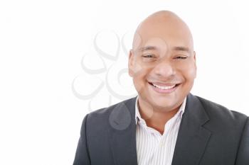 Handsome businessman smiling - isolated over a white background