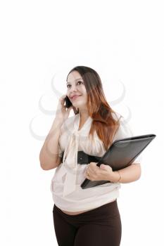 Pregnant woman making a cell phone call isolated over white