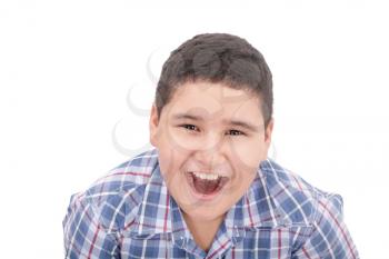 A boy screaming loud with mouth wide open 