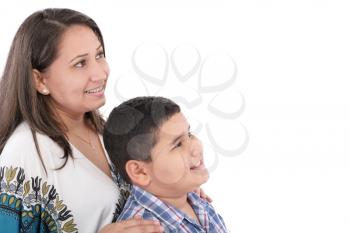 Happy mother with orthodontics and son isolated on light background 