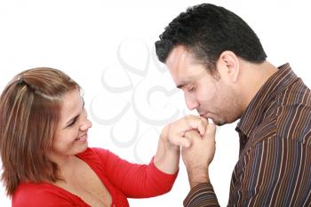 Husband kissing hand of smiling wife
