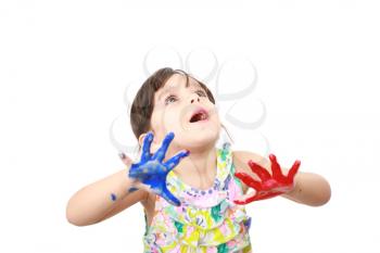 Learning and play themed image of a little girl with hands painted
